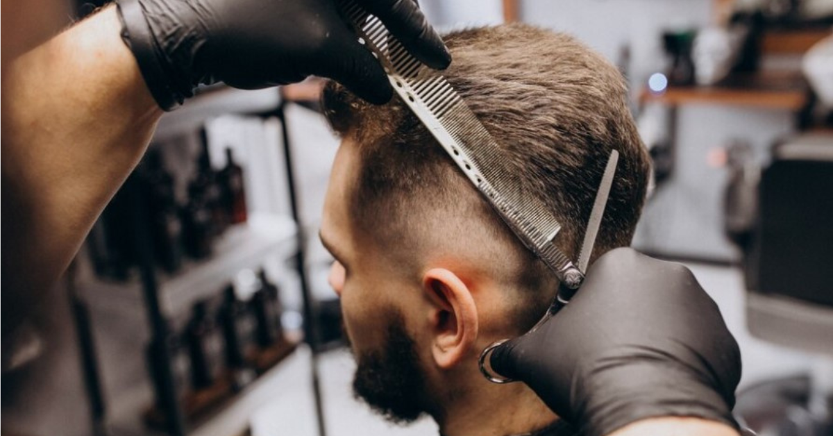 Hairdresser cutting hair in a salon, symbolizing transformation and personal growth.